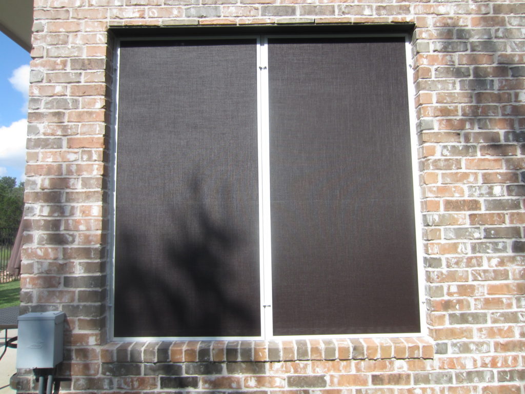 Great photo showing two side-by-side 35 by 70 in solar screens.