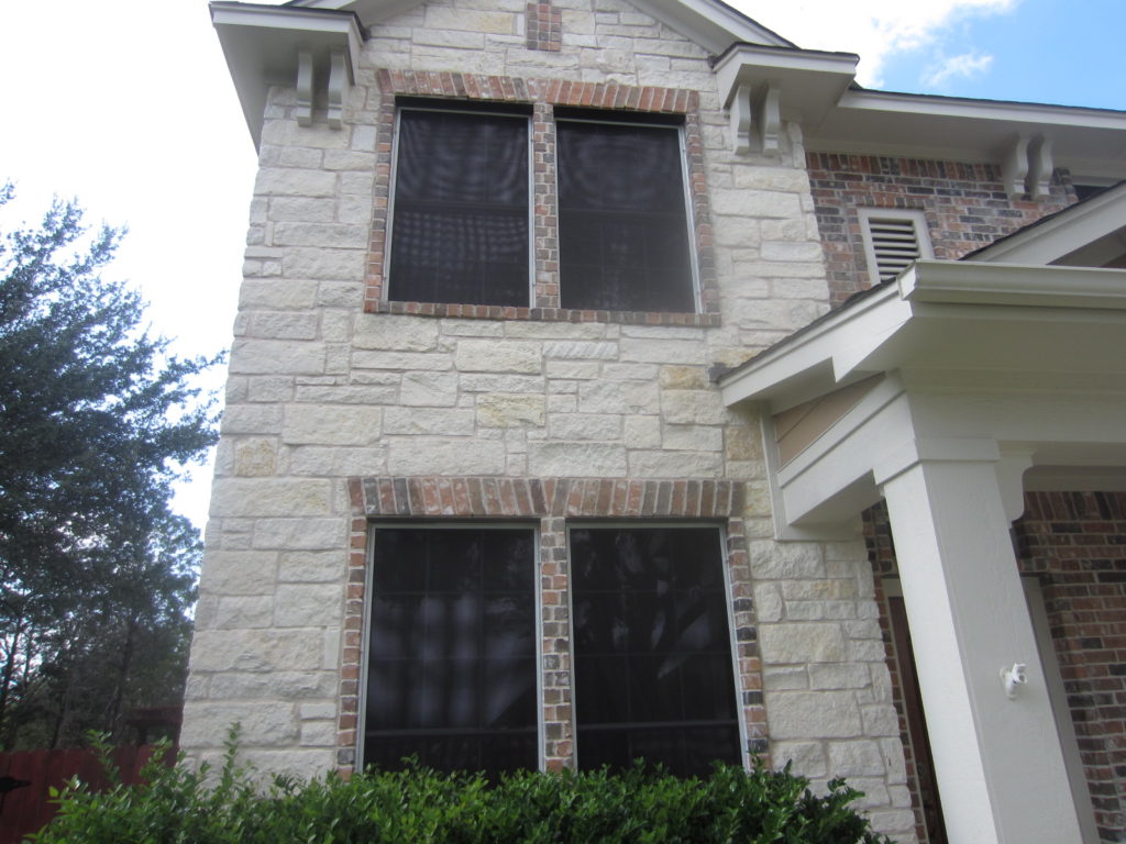 Front of Home showing four 80% solar screens.