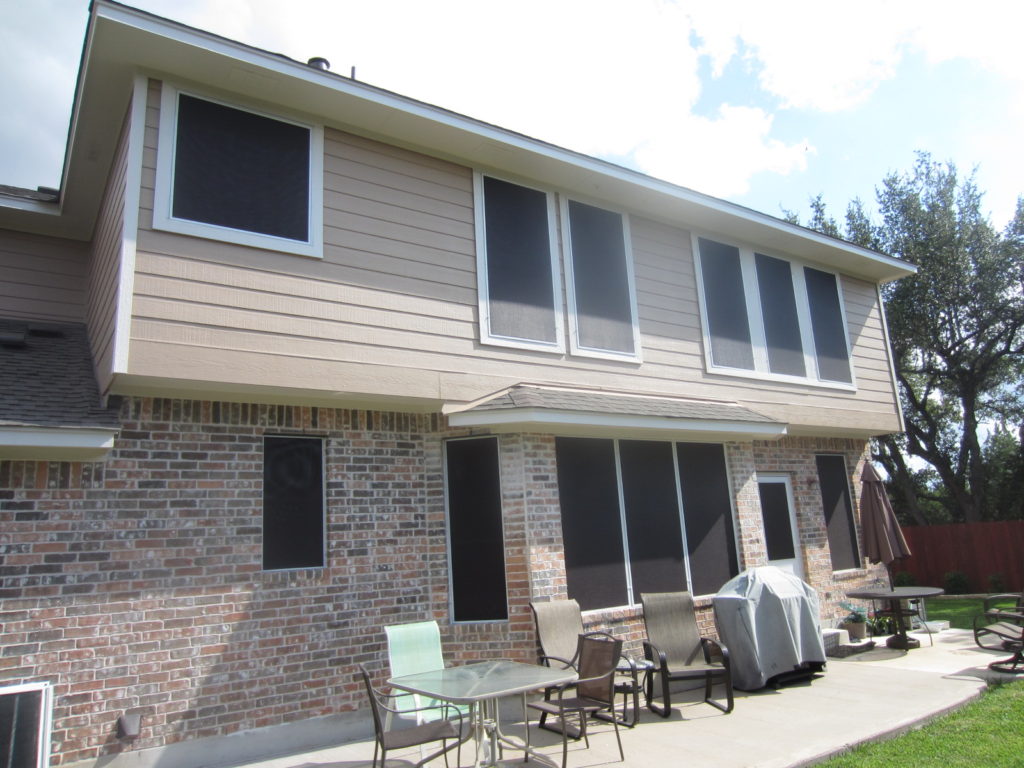 The back of this home received 90% solar screens. There are a total of 14 solar screens that we made for the windows here on the back of the home.
